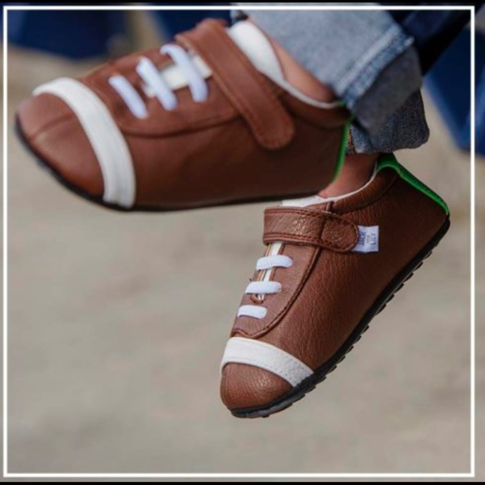 Football designed baby shoes